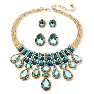 PalmBeach Jewelry Multi-Shape Aquamarine and Blue Crystal Three-Piece Necklace and Earrings Set in Gold Tone